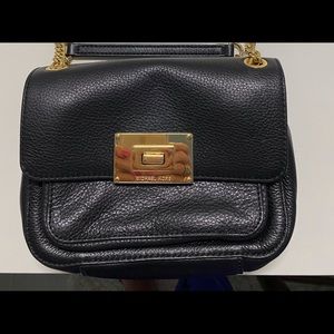 MK purse with gold shoulder strap